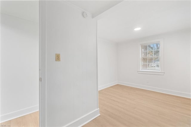 spare room with light hardwood / wood-style floors