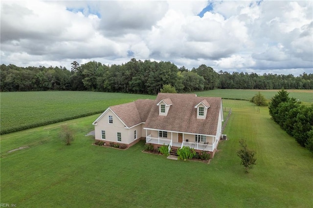 birds eye view of property featuring a rural view