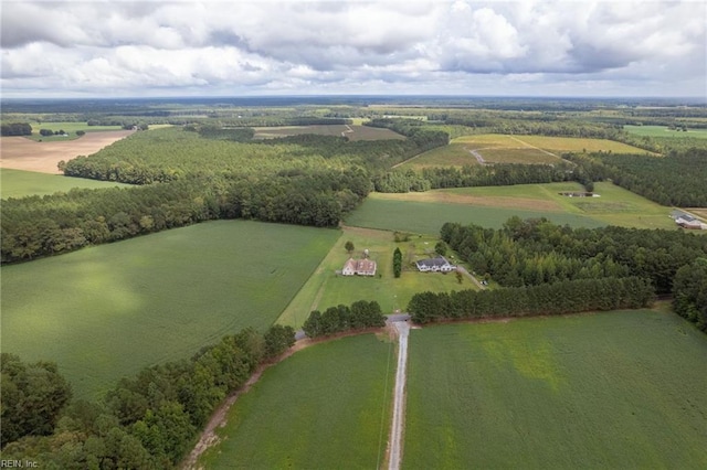 birds eye view of property with a rural view