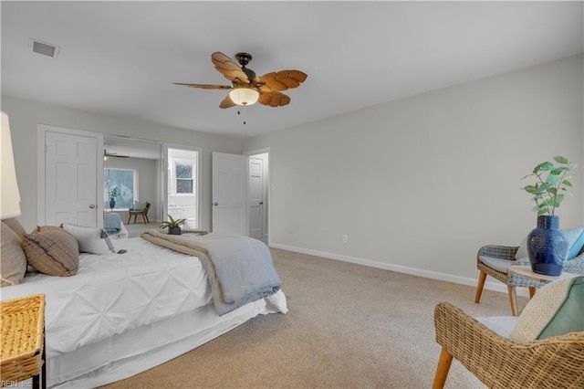 carpeted bedroom featuring ceiling fan