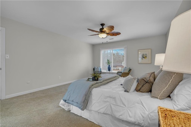 bedroom with ceiling fan and carpet