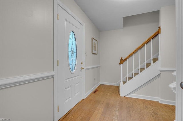 entrance foyer with light wood-type flooring