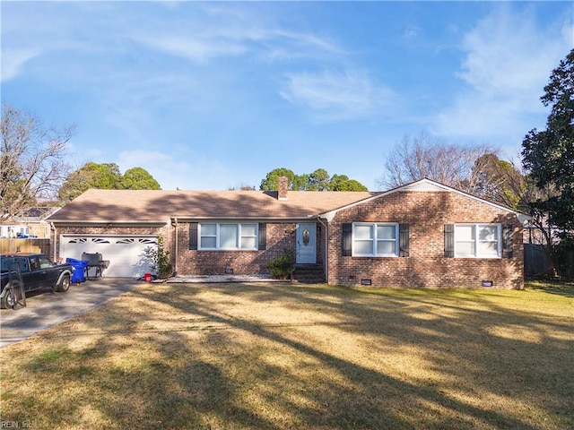 ranch-style house featuring a garage and a front lawn