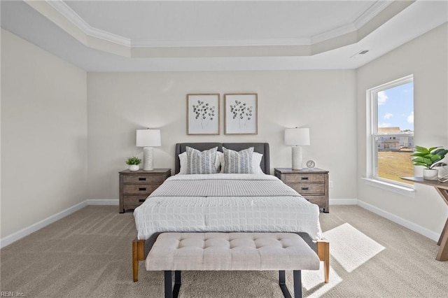 bedroom with light carpet, a raised ceiling, and ornamental molding