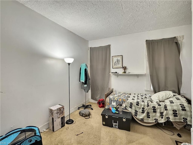 carpeted bedroom with a textured ceiling