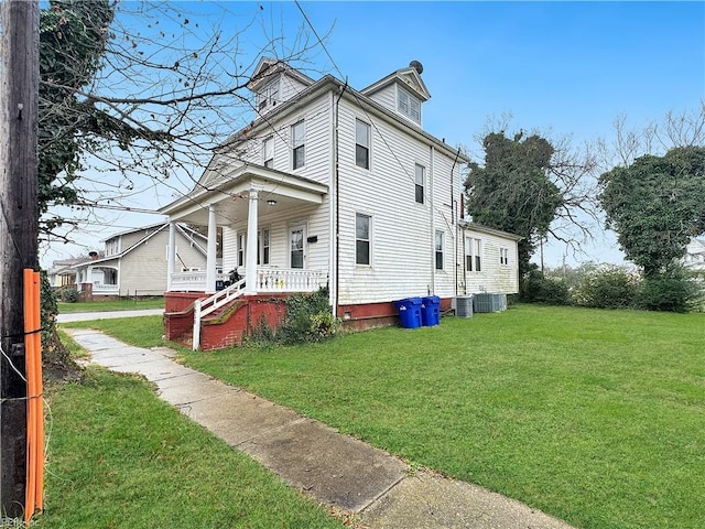 view of front of property with a front lawn and covered porch