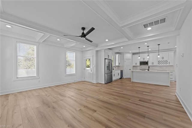 unfurnished living room featuring coffered ceiling, crown molding, ceiling fan, beam ceiling, and light hardwood / wood-style floors