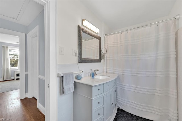 bathroom with vanity and wood-type flooring