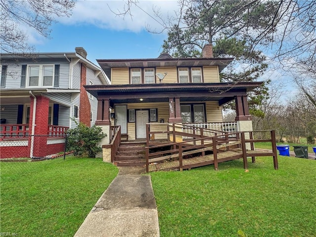 view of front of home featuring a porch and a front lawn