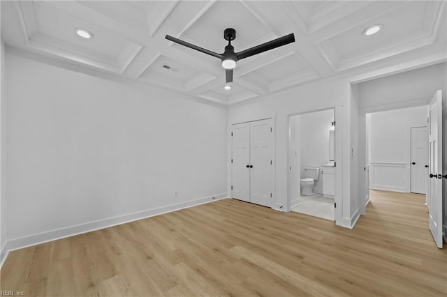 unfurnished bedroom featuring ceiling fan, beamed ceiling, coffered ceiling, and light wood-type flooring