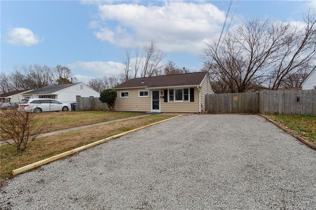 ranch-style house with a front yard