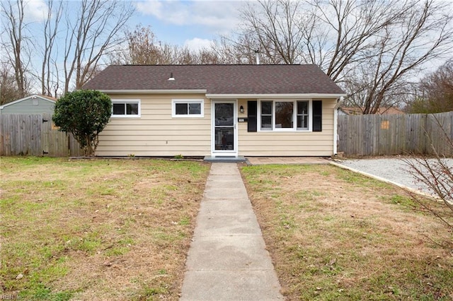 view of front of home with a front lawn