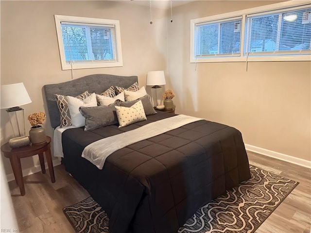 bedroom featuring hardwood / wood-style floors