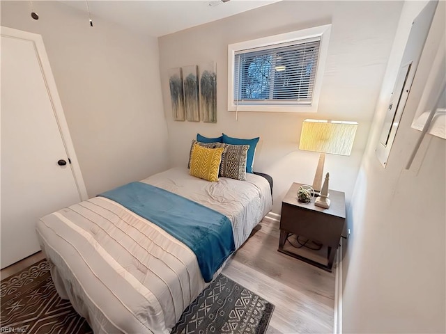 bedroom featuring hardwood / wood-style floors