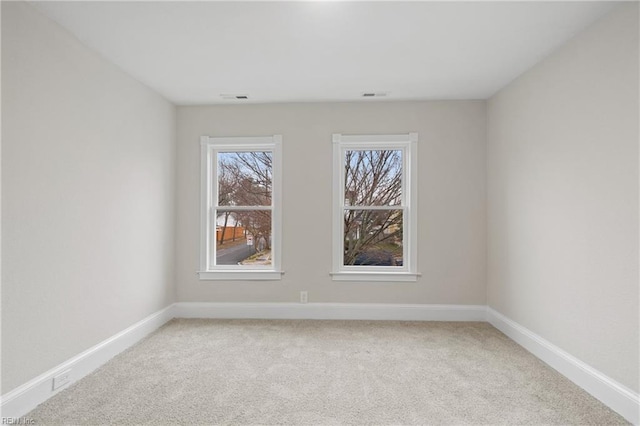 view of carpeted spare room