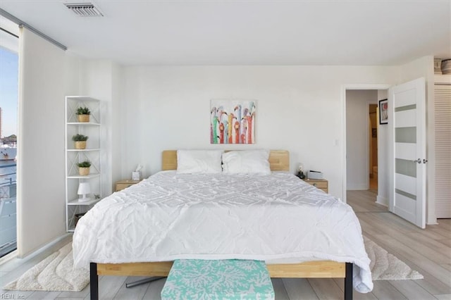 bedroom featuring light hardwood / wood-style floors