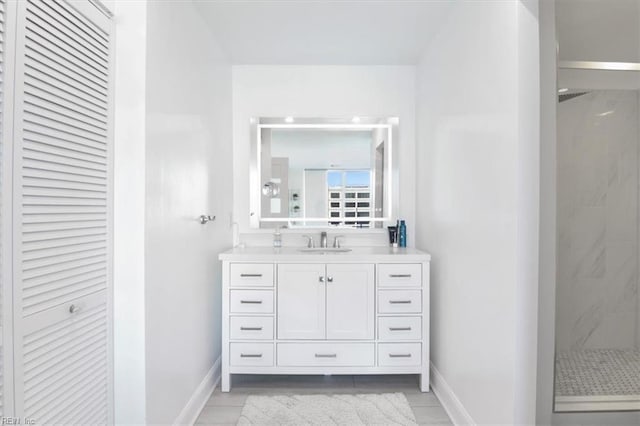 bathroom featuring vanity and walk in shower