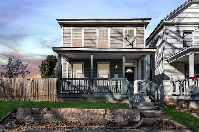 view of front property featuring a porch