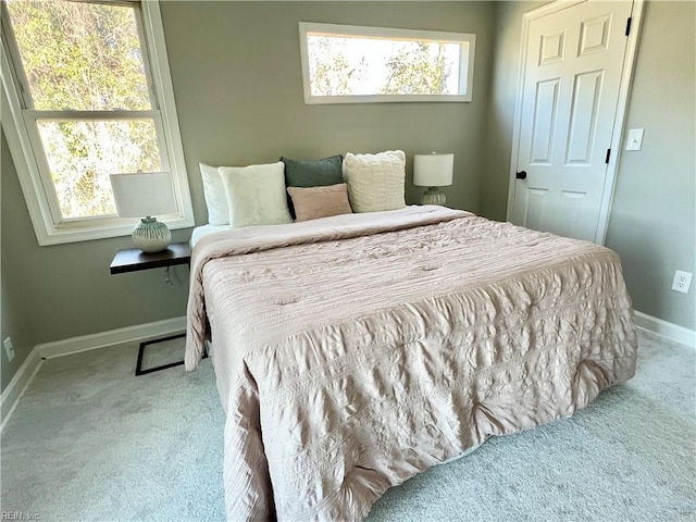 carpeted bedroom featuring a closet