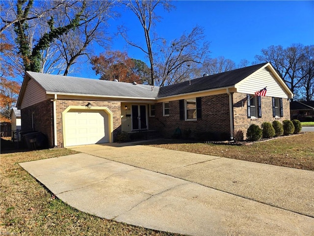 single story home featuring a garage