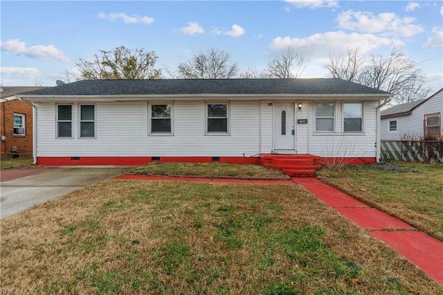 ranch-style home with a front lawn