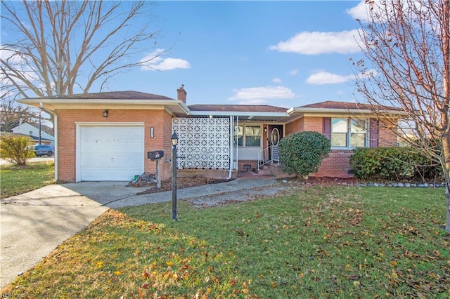 ranch-style home featuring a garage and a front lawn