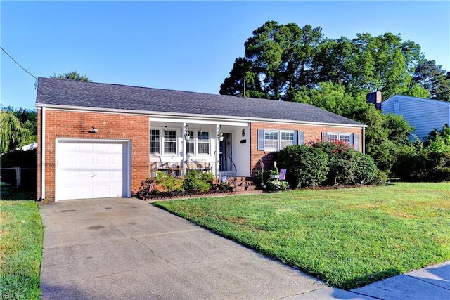 ranch-style home with a garage, covered porch, and a front lawn