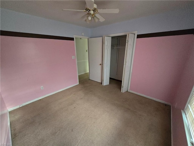 unfurnished bedroom with light carpet, a closet, and ceiling fan