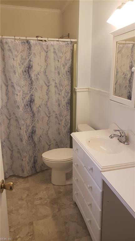 bathroom featuring walk in shower, toilet, vanity, and ornamental molding