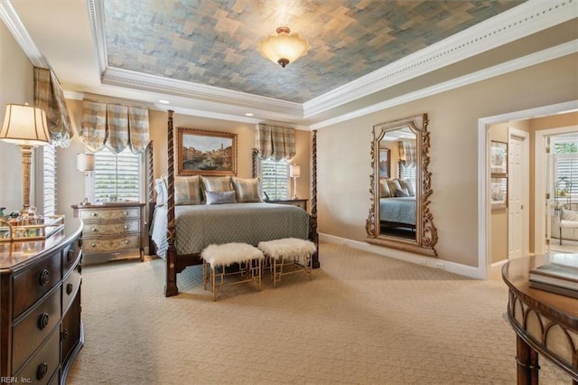 bedroom with a tray ceiling, light carpet, and ornamental molding