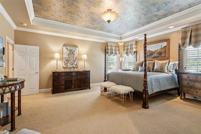 carpeted bedroom with a tray ceiling, multiple windows, and ornamental molding