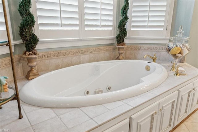 bathroom featuring a relaxing tiled tub