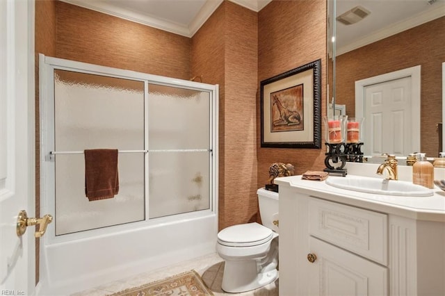 full bathroom with vanity, tile patterned floors, toilet, enclosed tub / shower combo, and ornamental molding