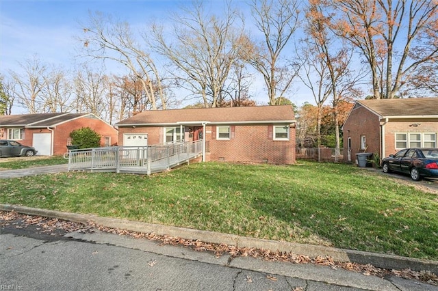 single story home with a front lawn and a wooden deck