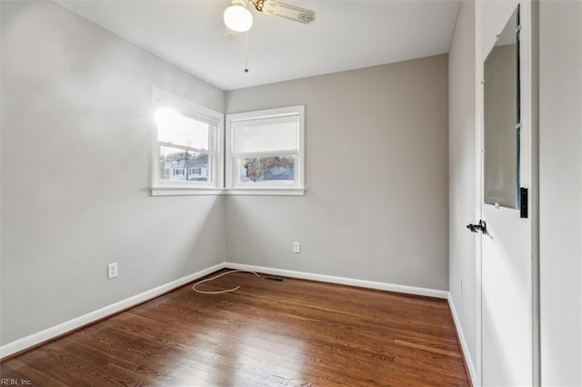 unfurnished room featuring ceiling fan and wood-type flooring