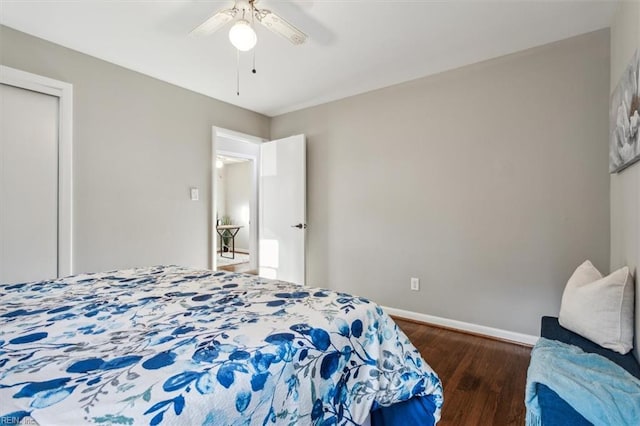 bedroom featuring ceiling fan and dark hardwood / wood-style flooring