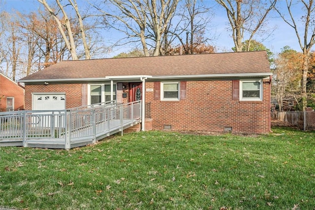 view of front facade featuring a front lawn, a garage, and a deck