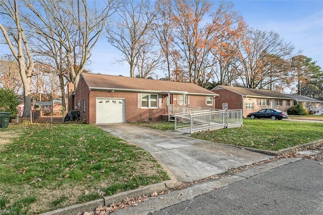 ranch-style home with a front yard and a garage