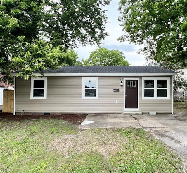 exterior space with a front yard