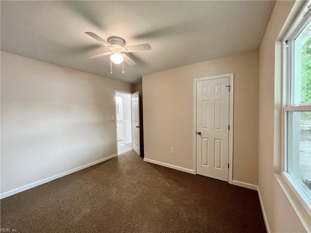 unfurnished bedroom featuring ceiling fan