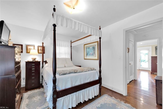 bedroom featuring hardwood / wood-style flooring