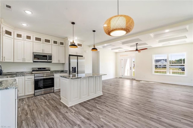 kitchen featuring white cabinetry, stainless steel appliances, coffered ceiling, beamed ceiling, and decorative light fixtures