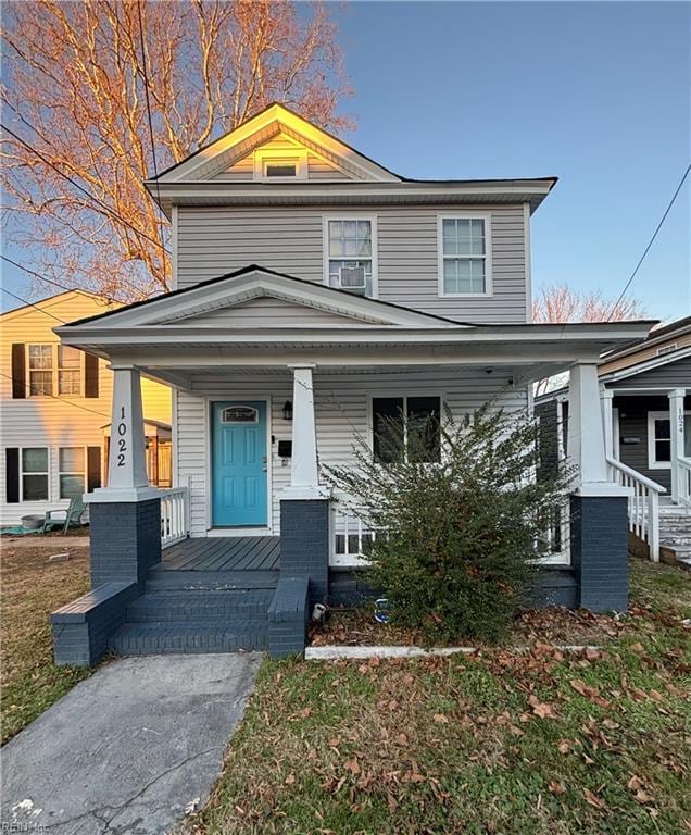 view of front of property featuring covered porch