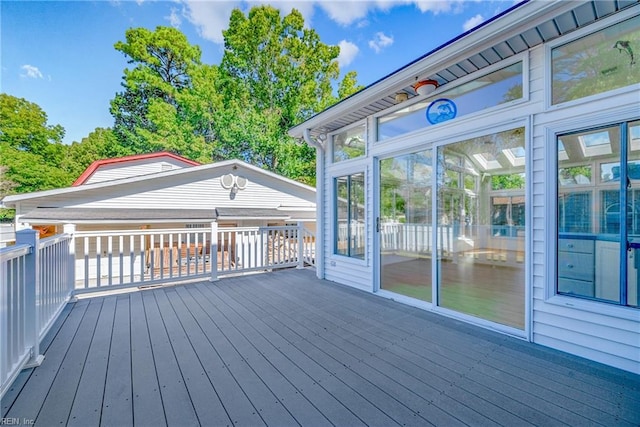 deck featuring a sunroom