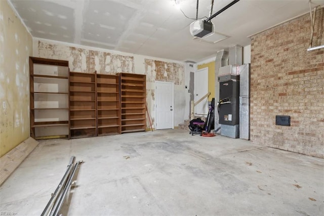 garage featuring heating unit and a garage door opener