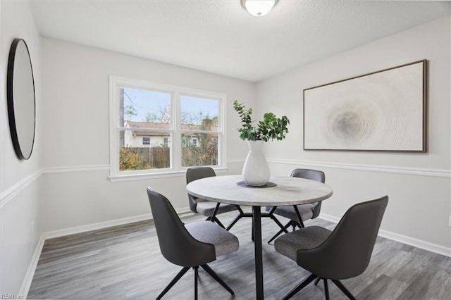 dining room featuring dark wood-type flooring