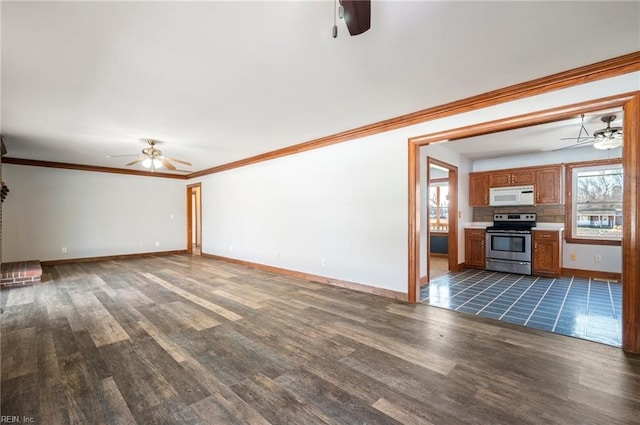 unfurnished living room featuring dark hardwood / wood-style floors and ornamental molding