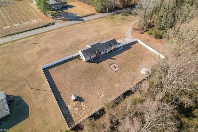 birds eye view of property featuring a rural view