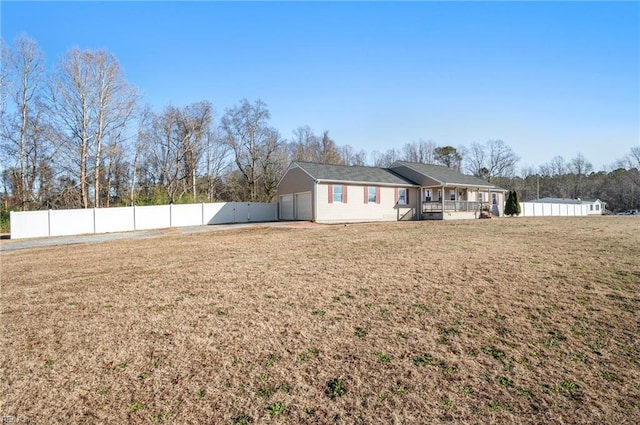 view of yard with covered porch