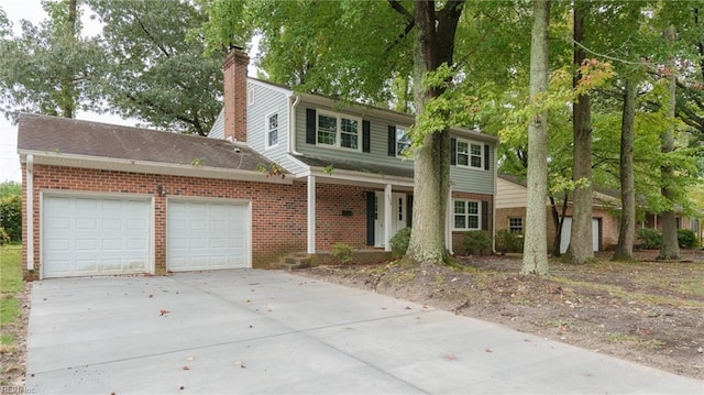 view of front of property with a garage